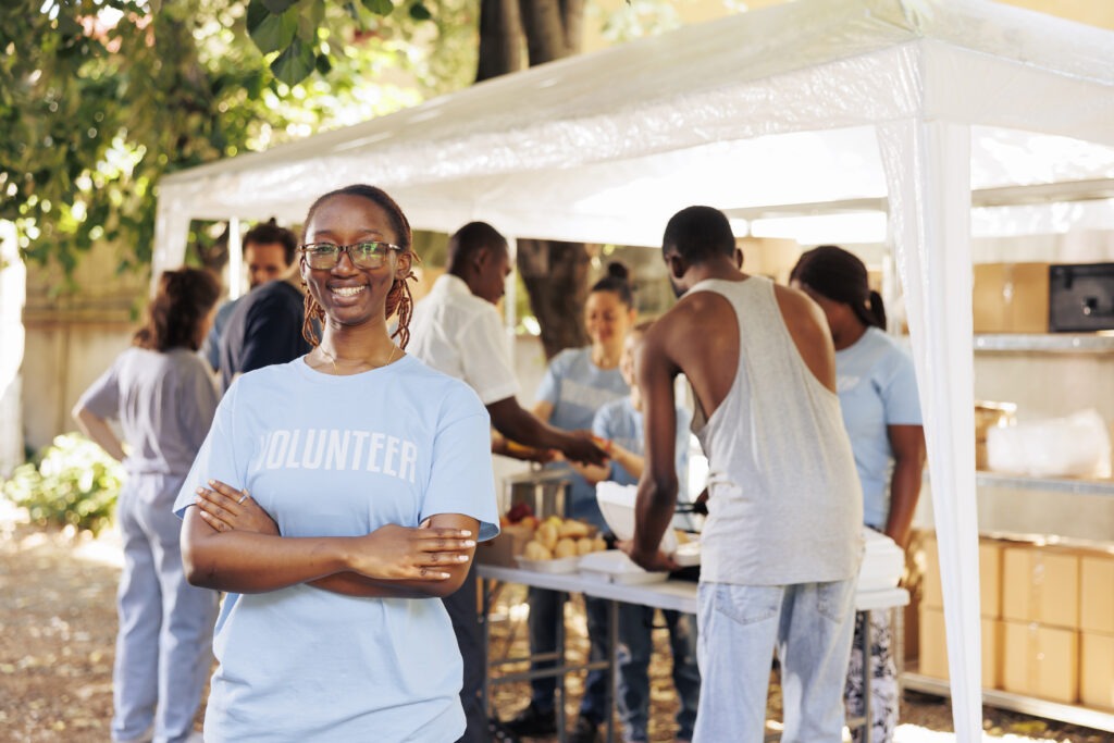 Lady volunteer with glasses at event